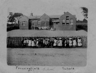 View of pupils and school when it was in the Cratfield Road.