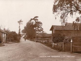Harleston Road in the past with Farriers outhouse on the left.
